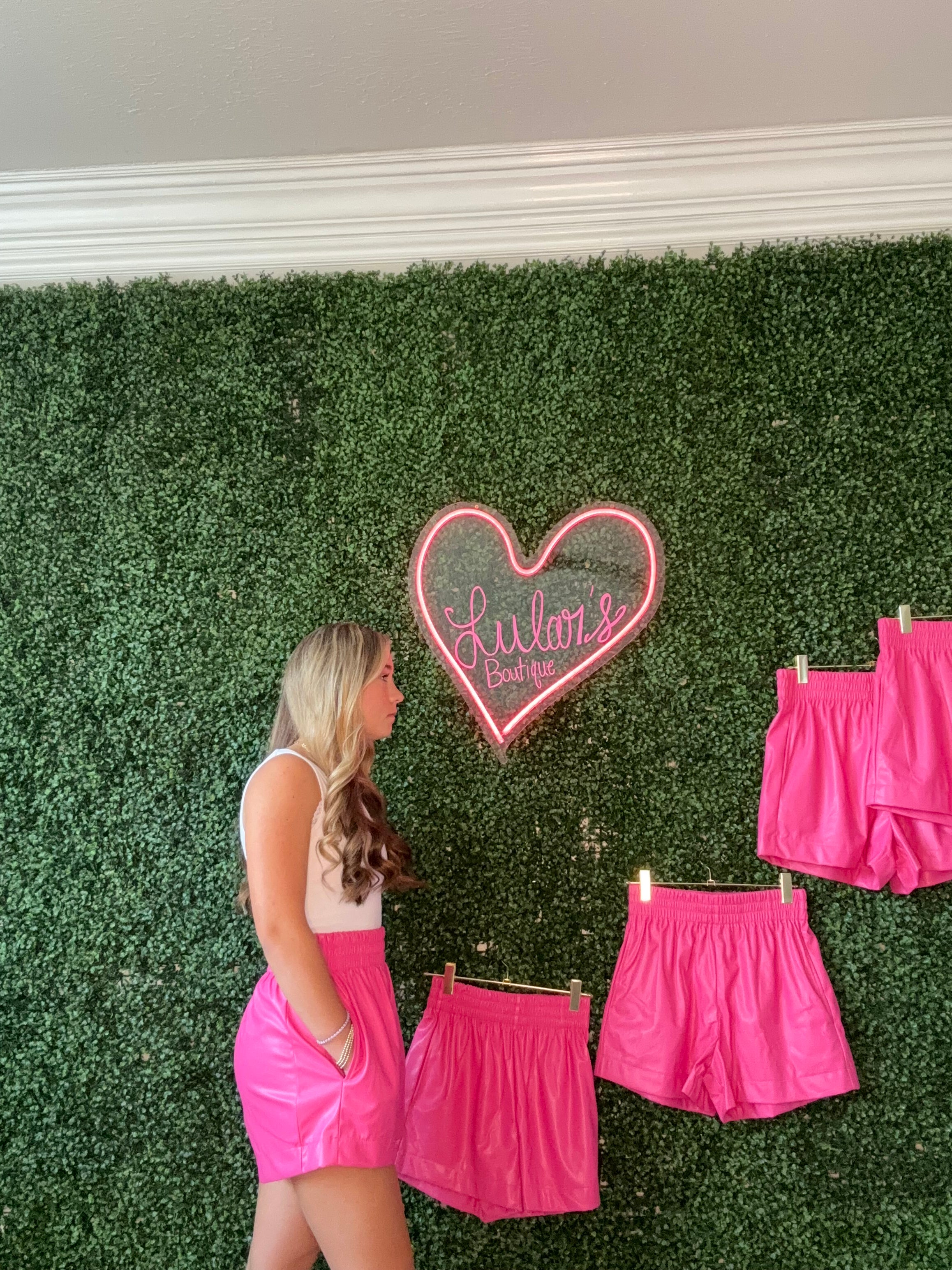 Hot in pink leather shorts