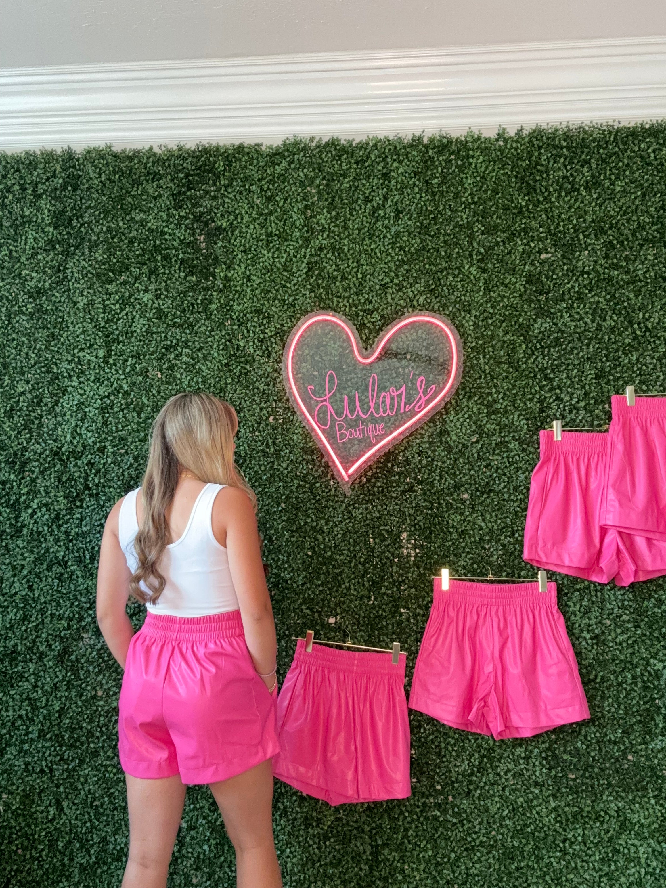 Hot in pink leather shorts