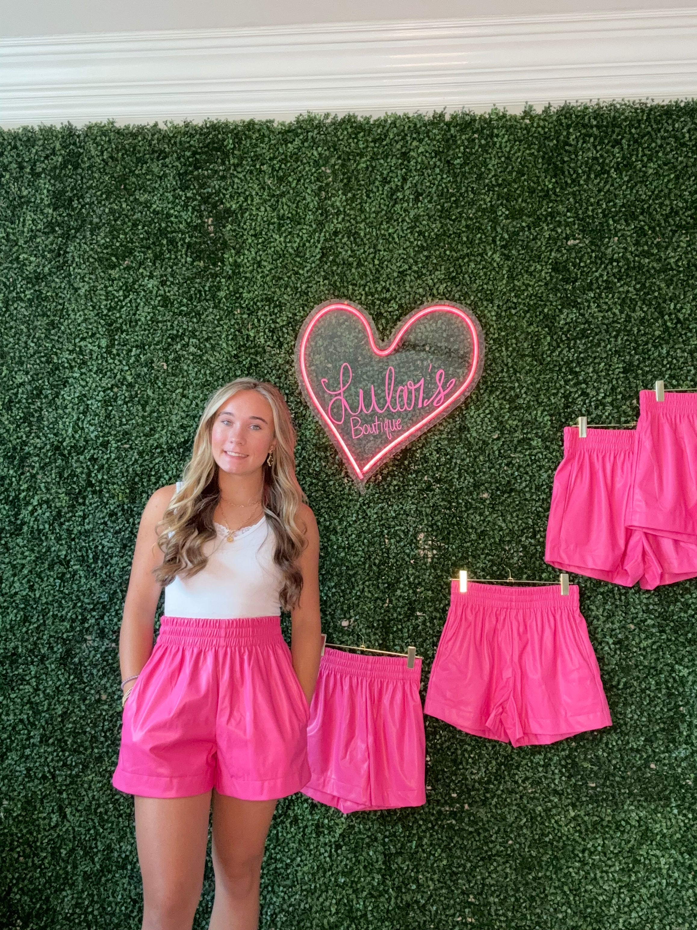 Hot in pink leather shorts
