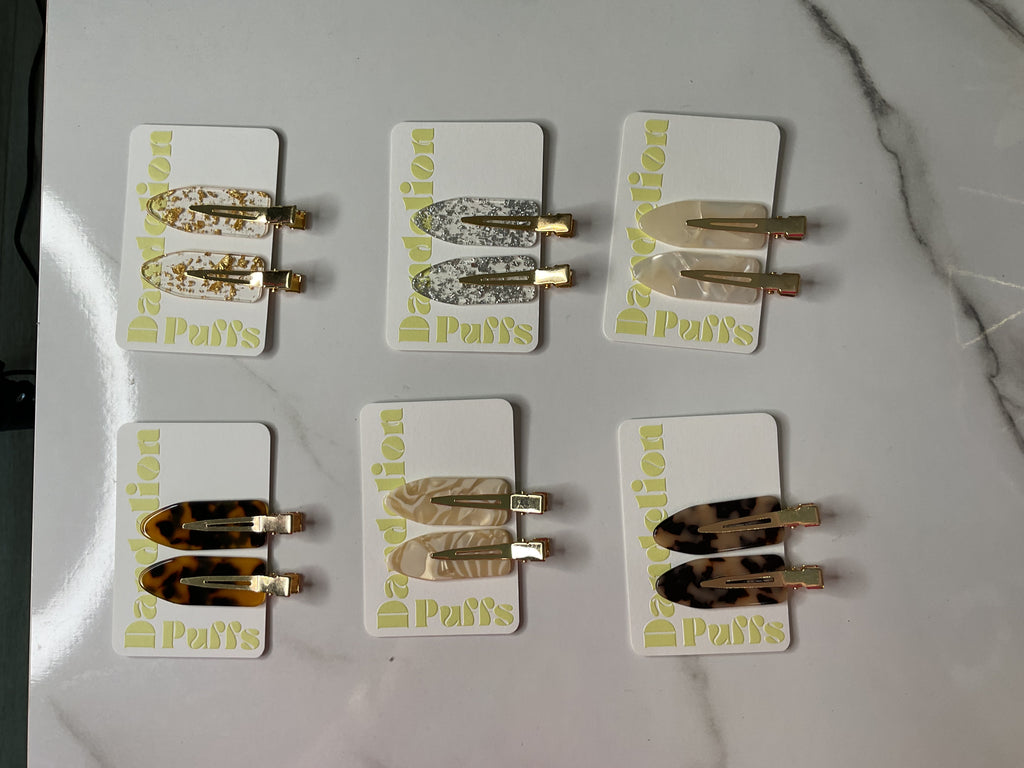 Dandelion puffs make up clips